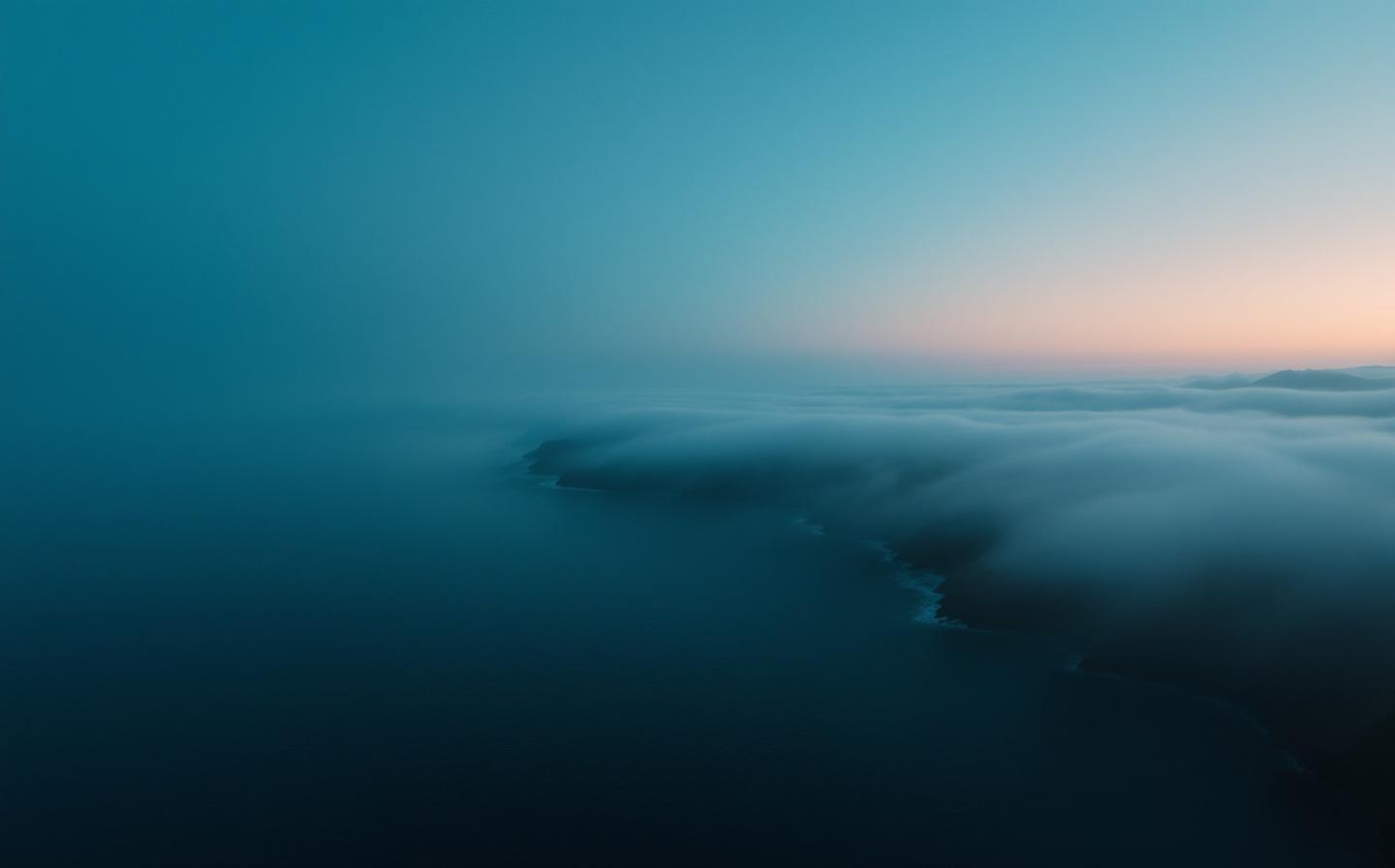 Misty coastline at dawn