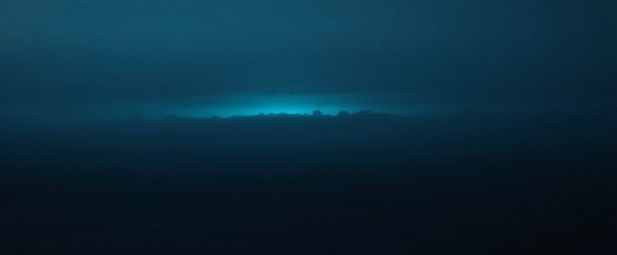Coastal fog rolling in over dark water